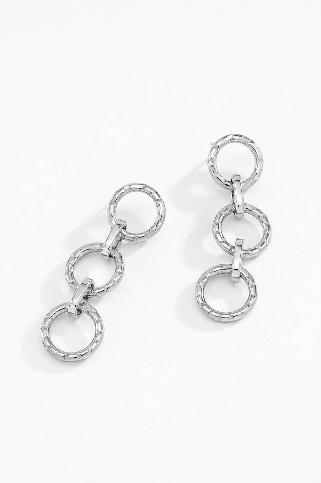 Boucles d'oreilles triple anneaux en acier 124AQ301