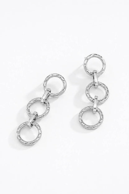 Boucles d'oreilles triple anneaux en acier 124AQ301