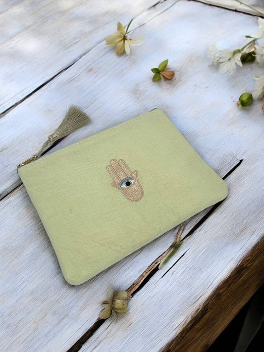 Trousse à maquillage main avec œil 20x15cm CY05