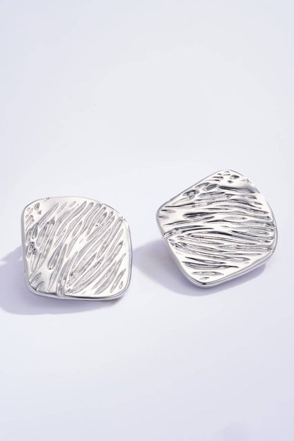 Boucles d'oreilles ondulées texturées 124AQ41