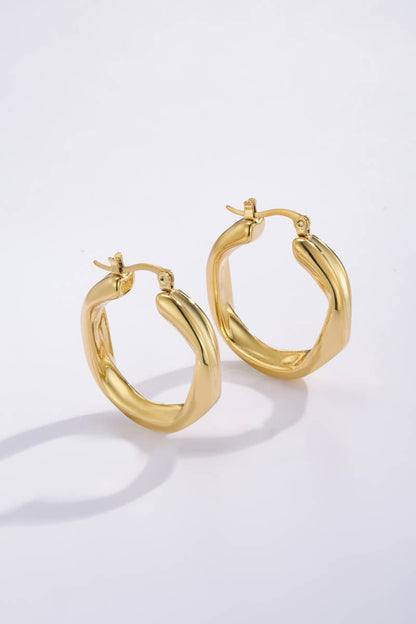 Boucles d'oreilles créoles texturées 124AQ45