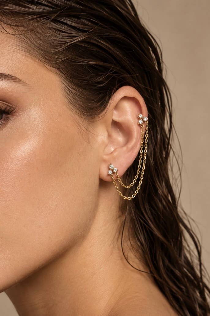 Mono-boucle double piercing étoile en acier 124AQ810